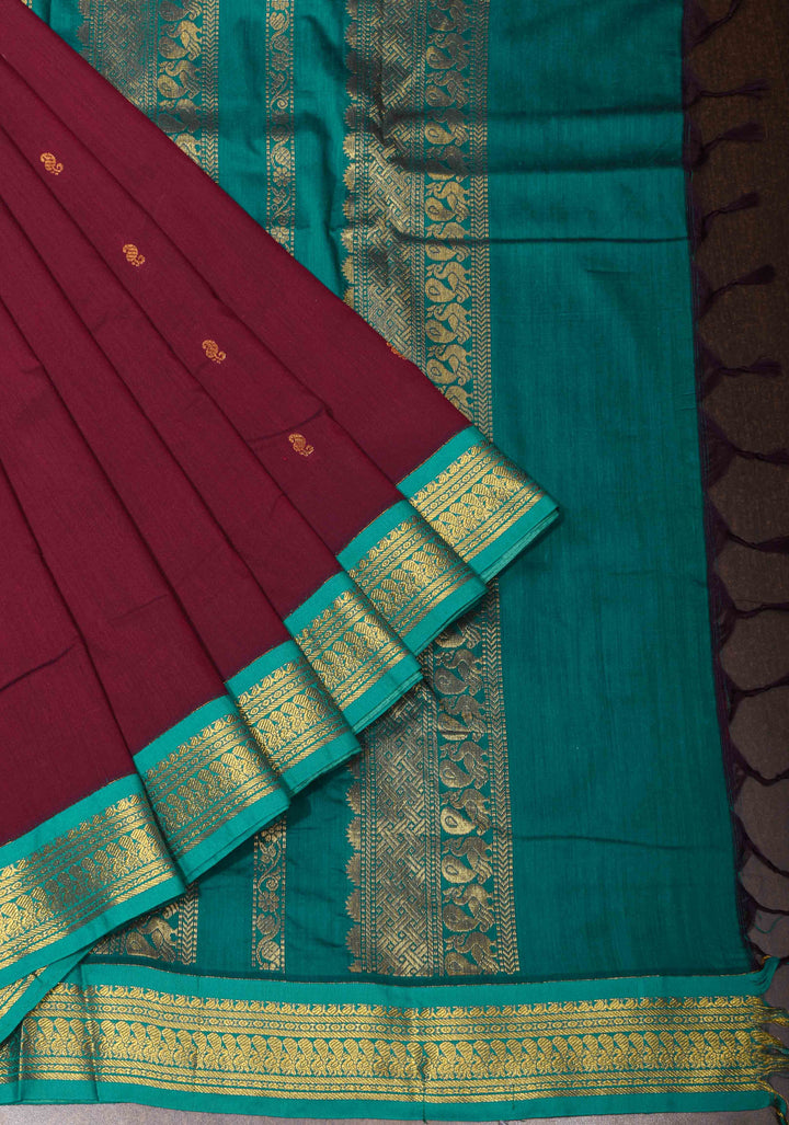 Maroon Cotton Silk Saree with Zari Buttas and  Contrast Teal Border