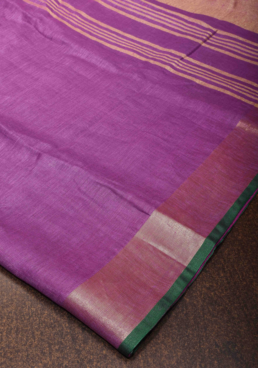 Purple Linen by Linen Saree with Zari Border and contrast green blouse Peice