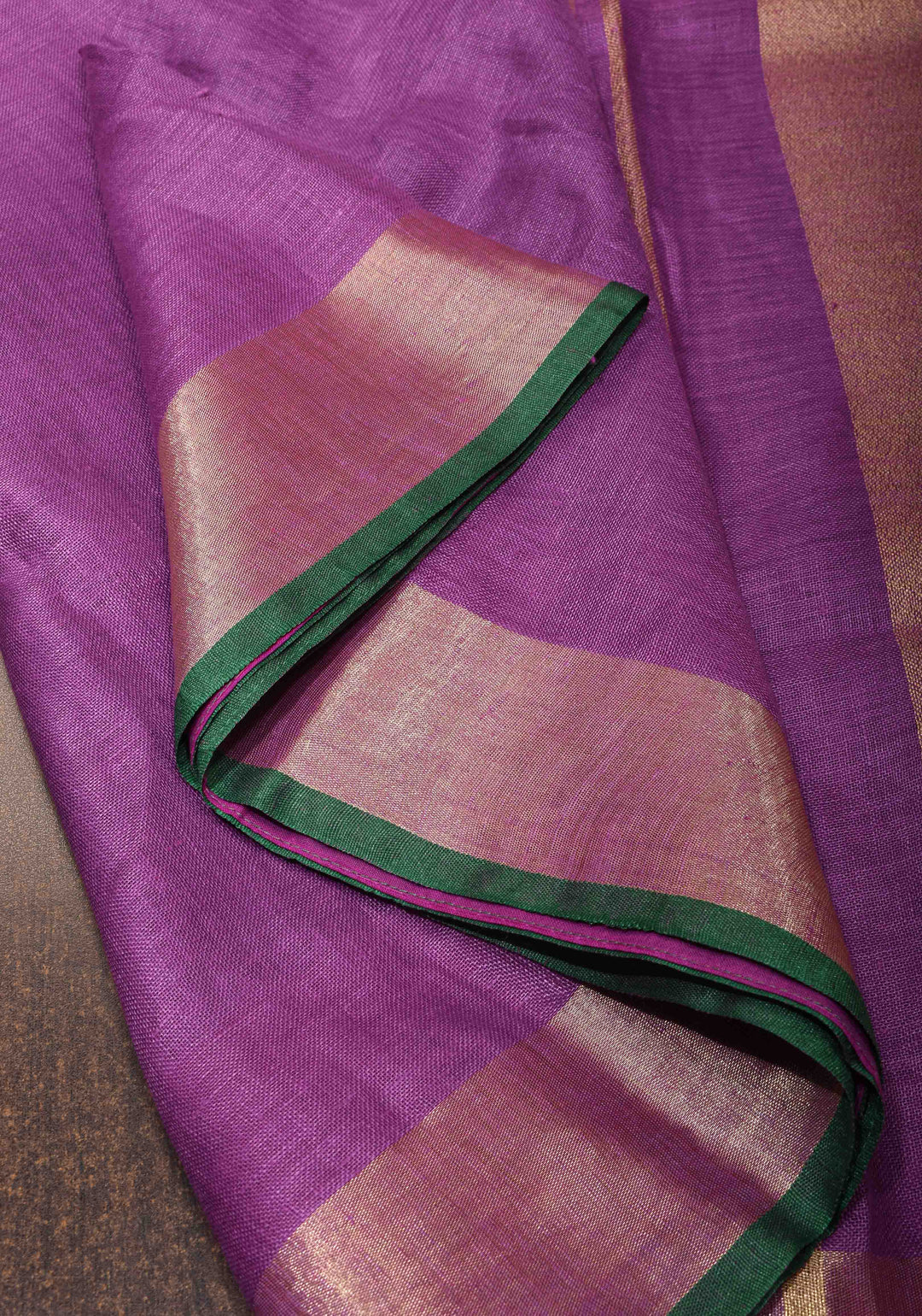 Purple Linen by Linen Saree with Zari Border and contrast green blouse Peice