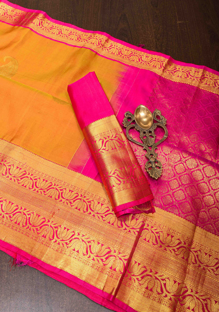 Vibrant Orange Pure Kanjivaram Silk Saree with Paisley Motifs and Wide  Zari Border | SILK MARK CERTIFIED