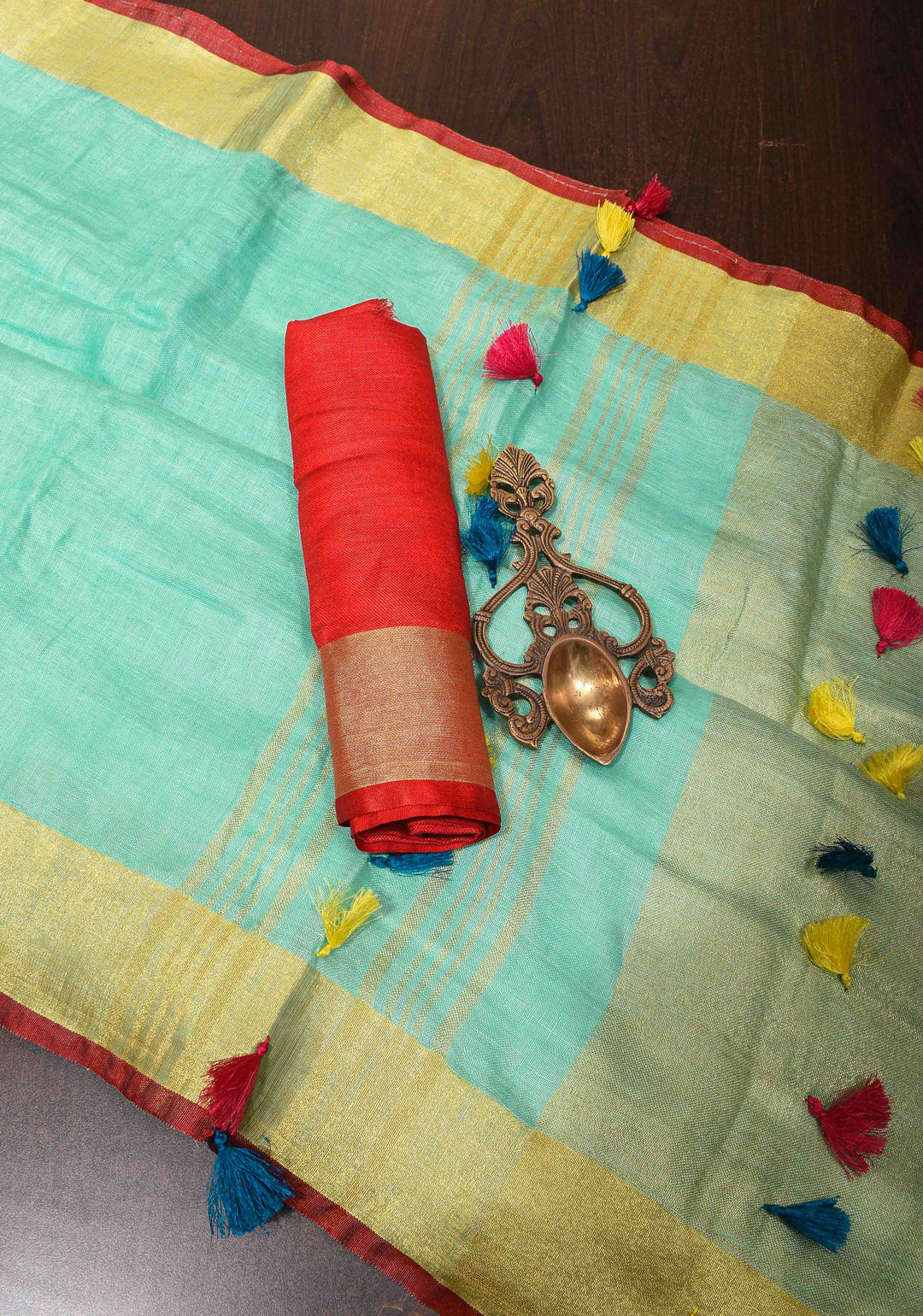 Seafoam Green Linen By  Linen Saree with Zari Border and Multicolor Tassels on Pallu