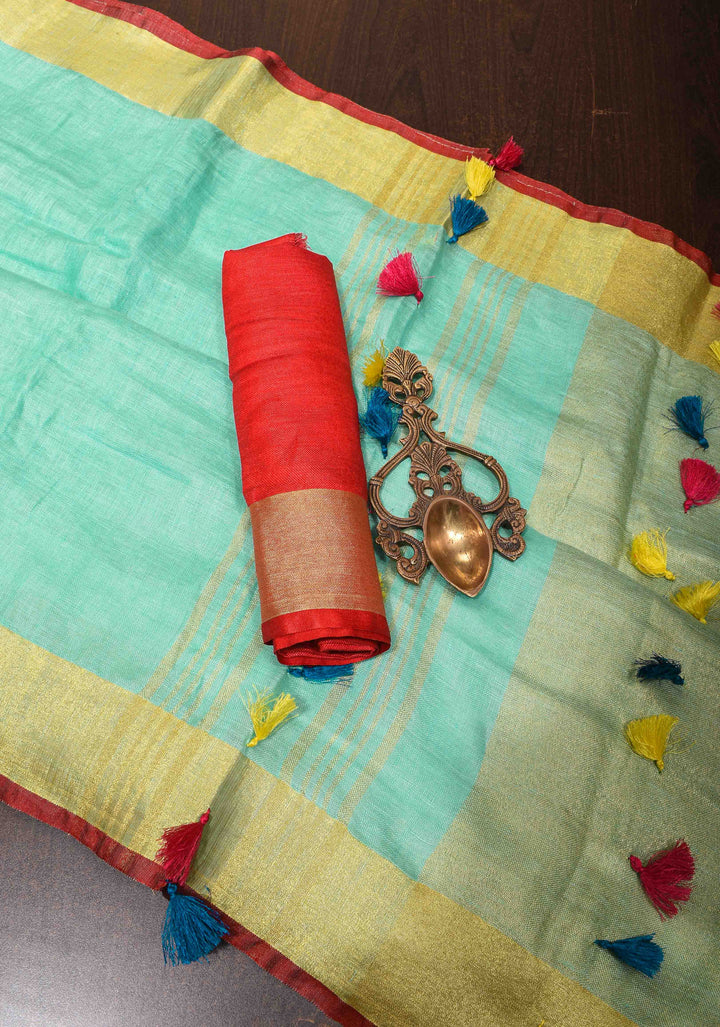 Seafoam Green Linen By  Linen Saree with Zari Border and Multicolor Tassels on Pallu