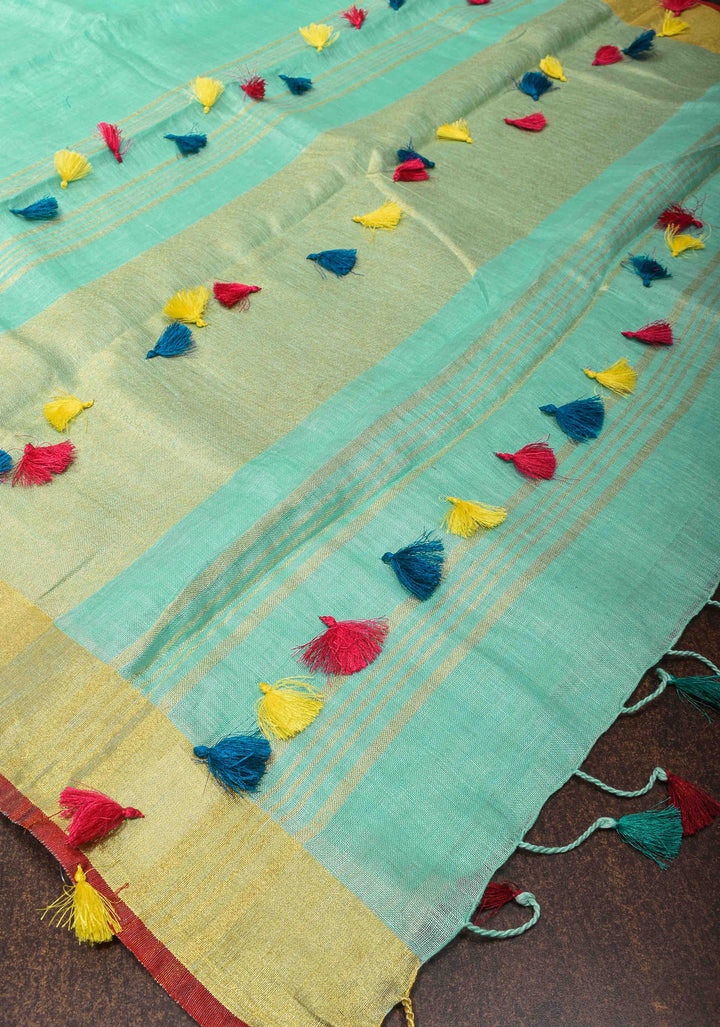 Seafoam Green Linen By  Linen Saree with Zari Border and Multicolor Tassels on Pallu