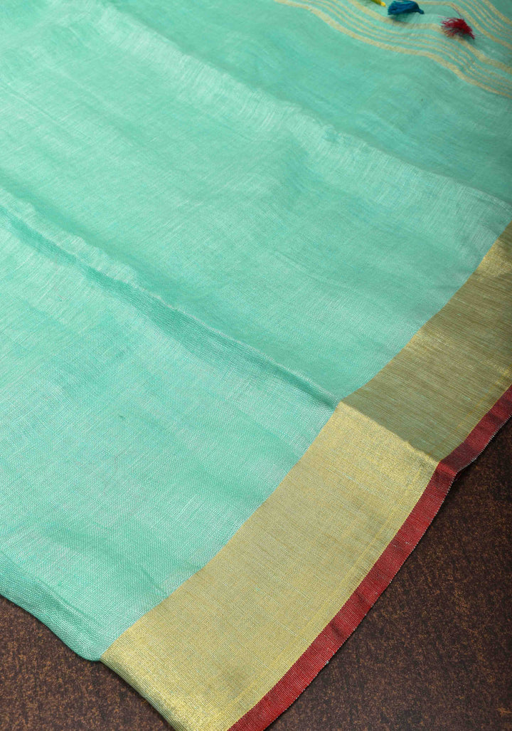 Seafoam Green Linen By  Linen Saree with Zari Border and Multicolor Tassels on Pallu