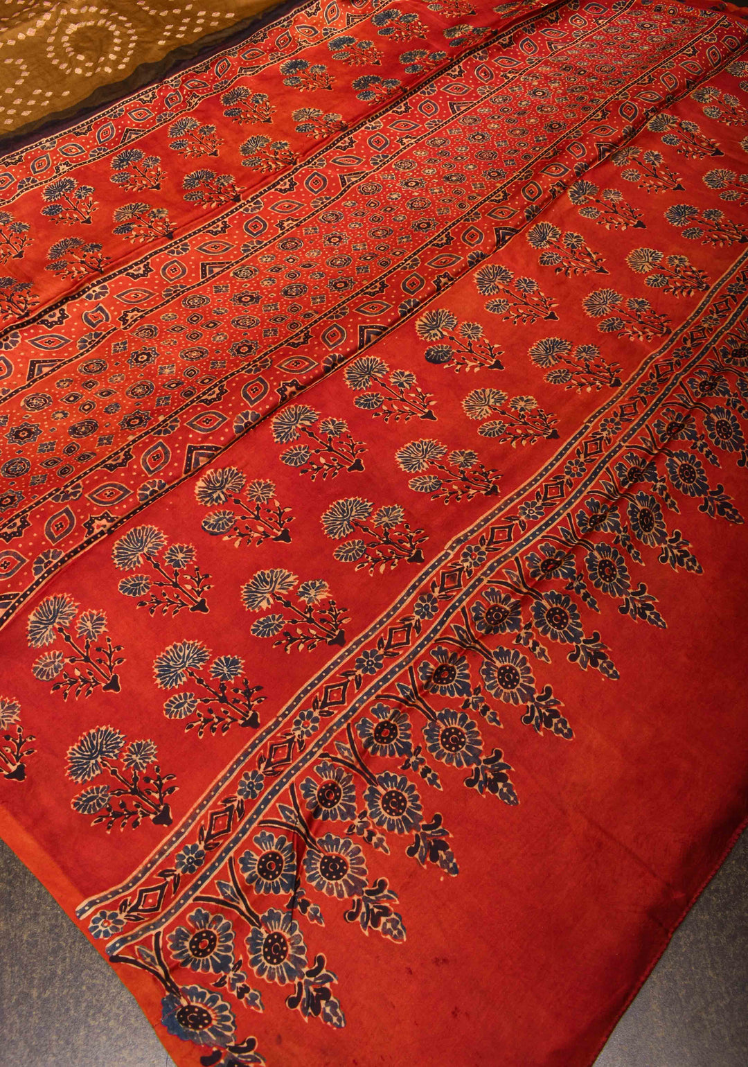 Sarkam bandhej on modal silk saree Henna Green with ajrakh handblock on pallu and border