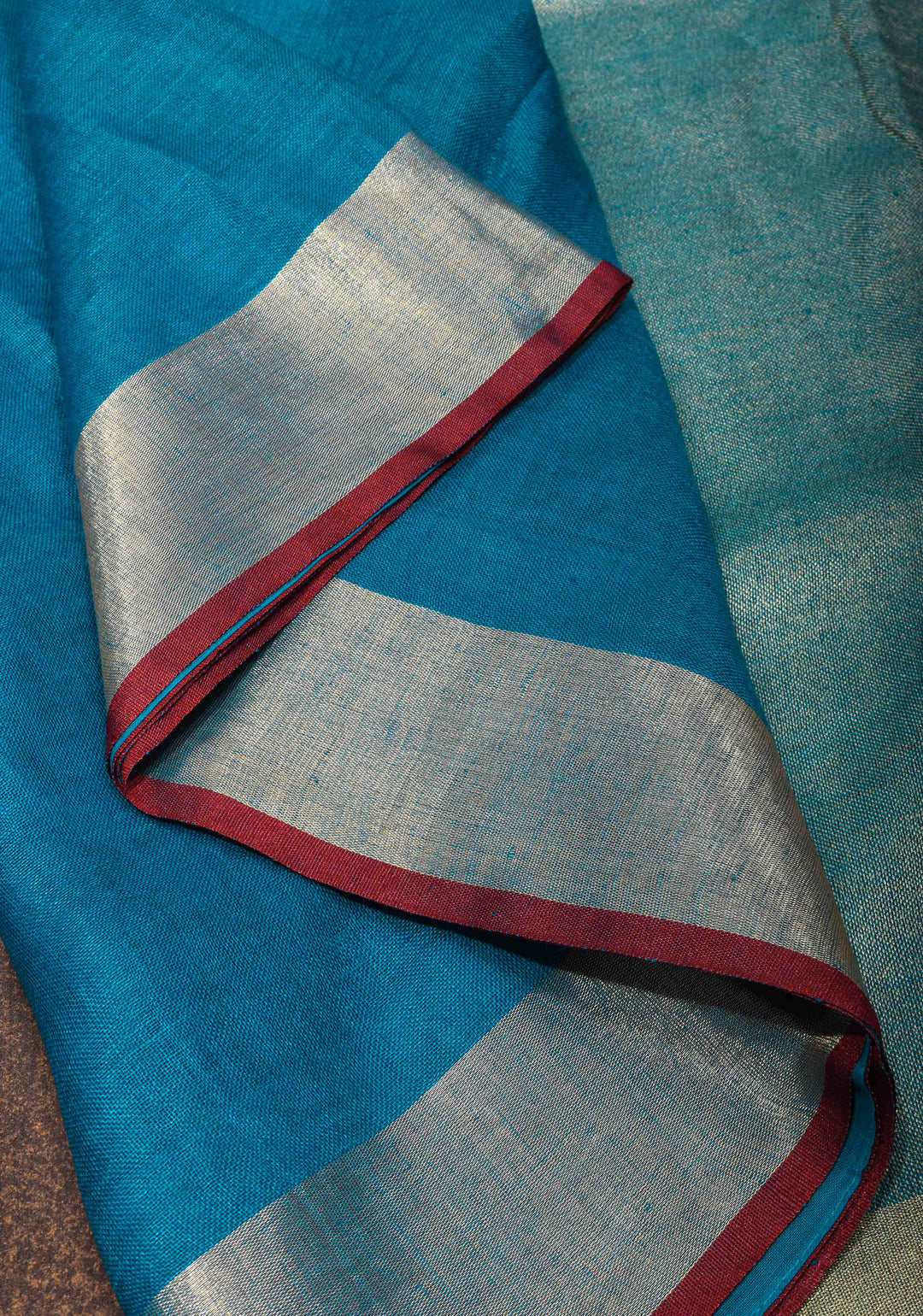Bluish Cyan Linen by Linen Saree with Zari Border and Contrast Blouse Piece