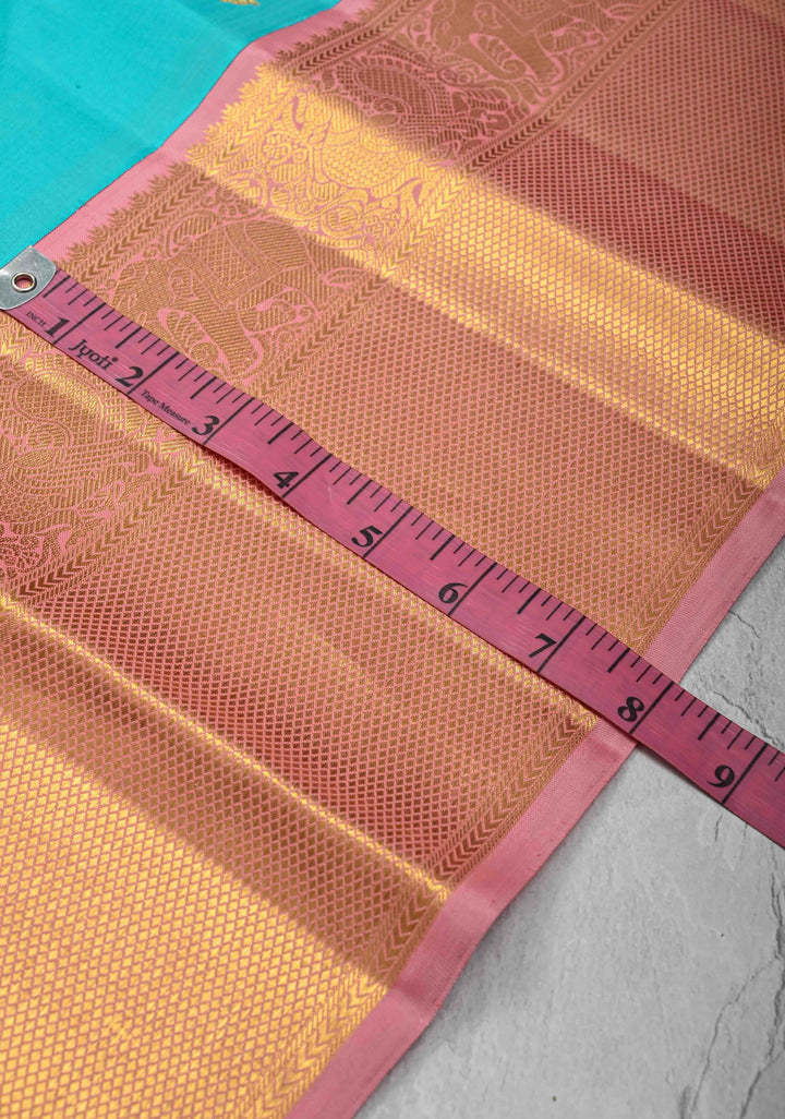 Turquoise Kanjivaram Pure Silk Saree with Floral Buttas and Contrast Zari Border | SILK MARK CERTIFIED