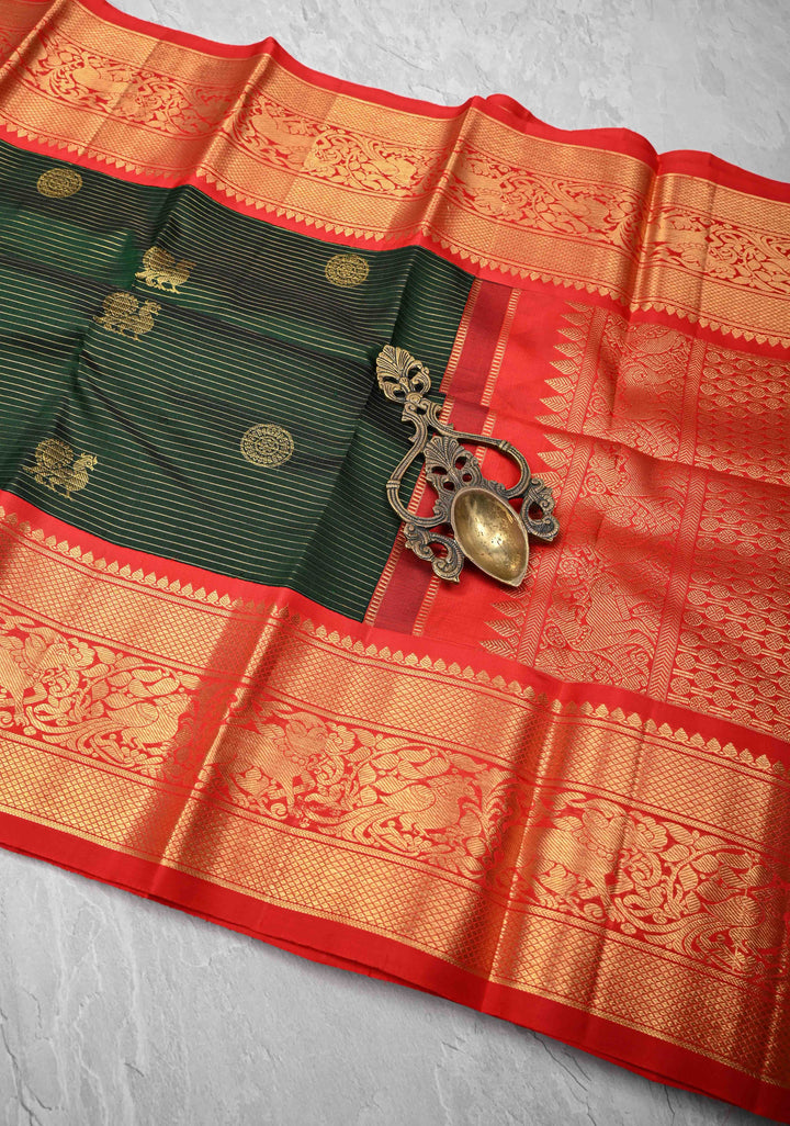 Bottle Green Kanjivaram Pure Silk Saree with Zari Stripes  Buttas and Contrast  Border | SILK MARK CERTIFIED