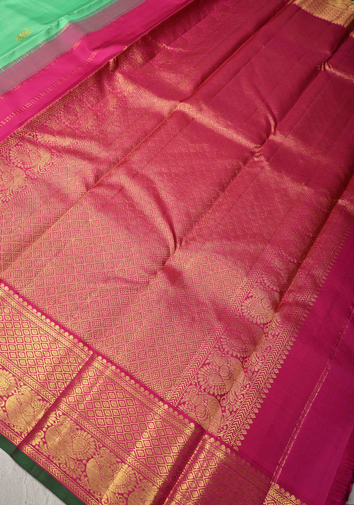 Meduim Spring Green Kanjivaram Pure Silk Saree with Floral Zari Buttas and Korvai Contrast Zari Border | SILK MARK CERTIFIED
