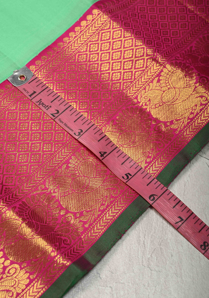 Meduim Spring Green Kanjivaram Pure Silk Saree with Floral Zari Buttas and Korvai Contrast Zari Border | SILK MARK CERTIFIED