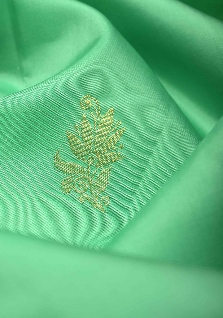 Meduim Spring Green Kanjivaram Pure Silk Saree with Floral Zari Buttas and Korvai Contrast Zari Border | SILK MARK CERTIFIED