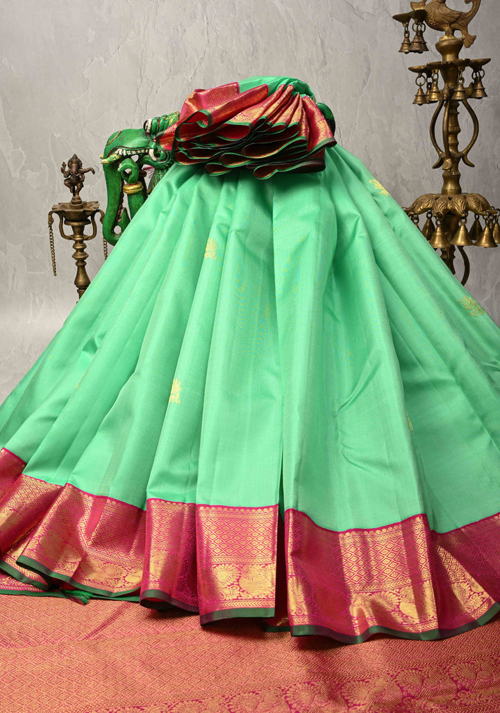 Meduim Spring Green Kanjivaram Pure Silk Saree with Floral Zari Buttas and Korvai Contrast Zari Border | SILK MARK CERTIFIED