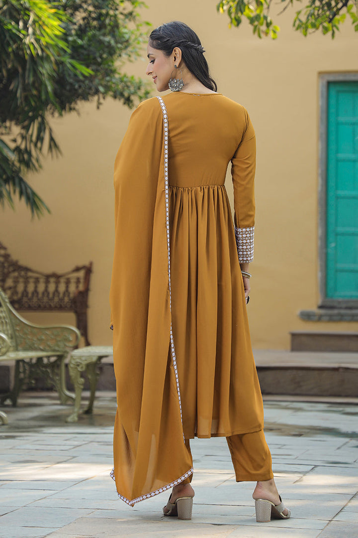 Mustard Poly Georgette Yoke Design Suit Set | SHOBITAM