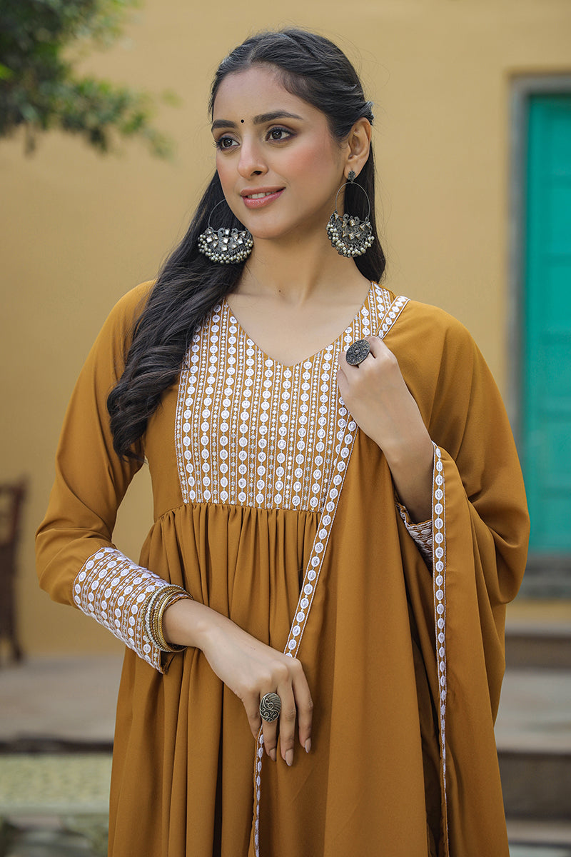 Mustard Poly Georgette Yoke Design Suit Set | SHOBITAM