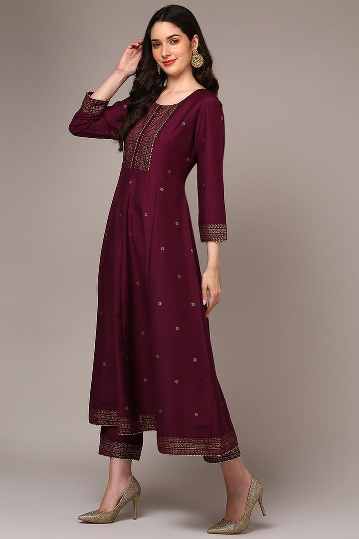 Burgundy Silk Blend Woven Design Flared Suit Set | SHOBITAM