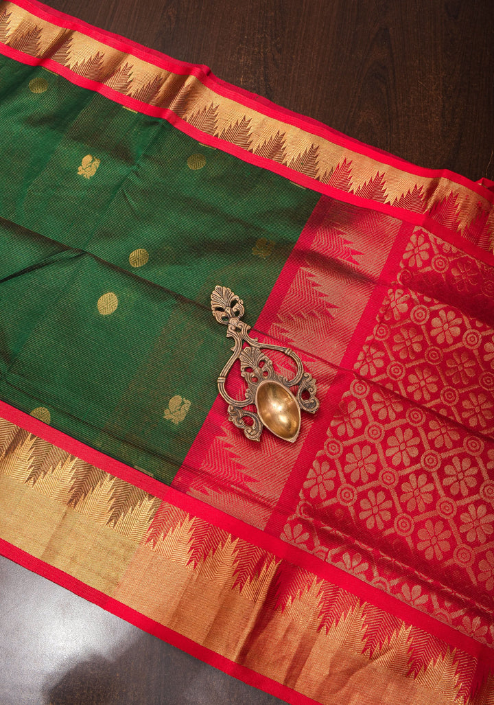 Kanchi Silk Cotton in Green and Red with Zari buttas and Temple Border