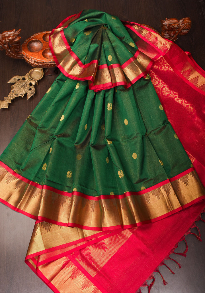 Kanchi Silk Cotton in Green and Red with Zari buttas and Temple Border