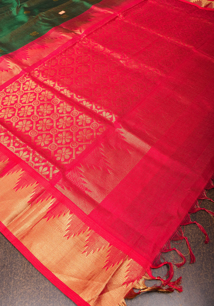 Kanchi Silk Cotton in Green and Red with Zari buttas and Temple Border