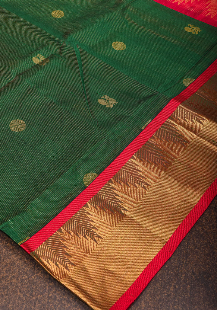 Kanchi Silk Cotton in Green and Red with Zari buttas and Temple Border