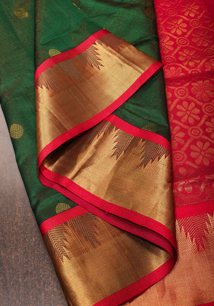 Kanchi Silk Cotton in Green and Red with Zari buttas and Temple Border