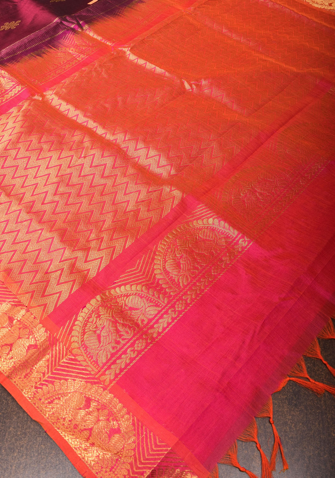 Kanchi Silk Cotton in Burgundy with Rangoli buttas and Zari border