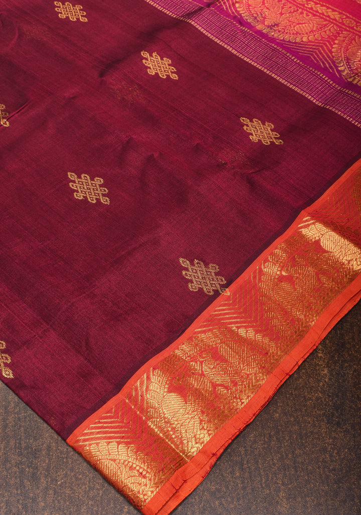 Kanchi Silk Cotton in Burgundy with Rangoli buttas and Zari border