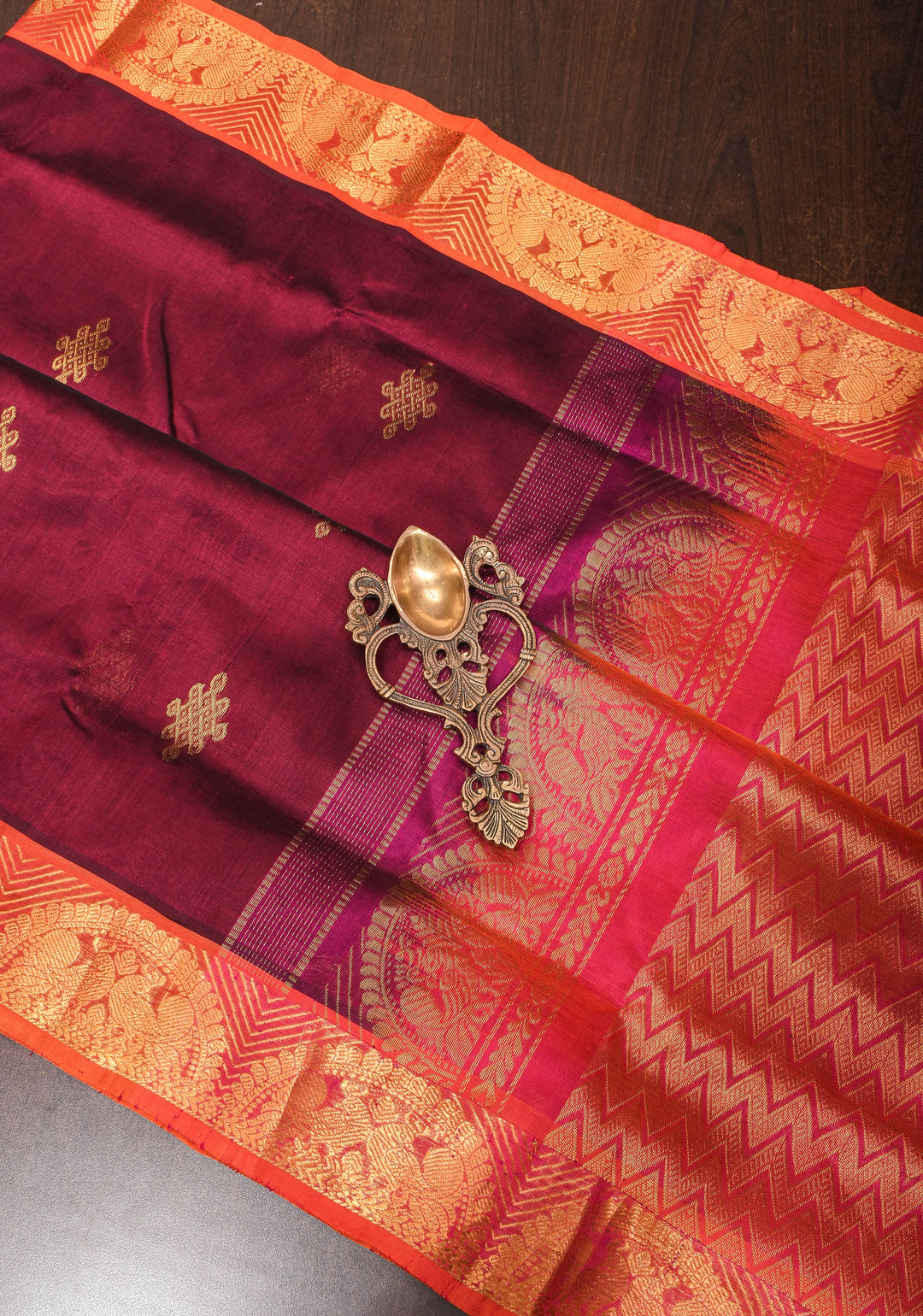 Kanchi Silk Cotton in Burgundy with Rangoli buttas and Zari border
