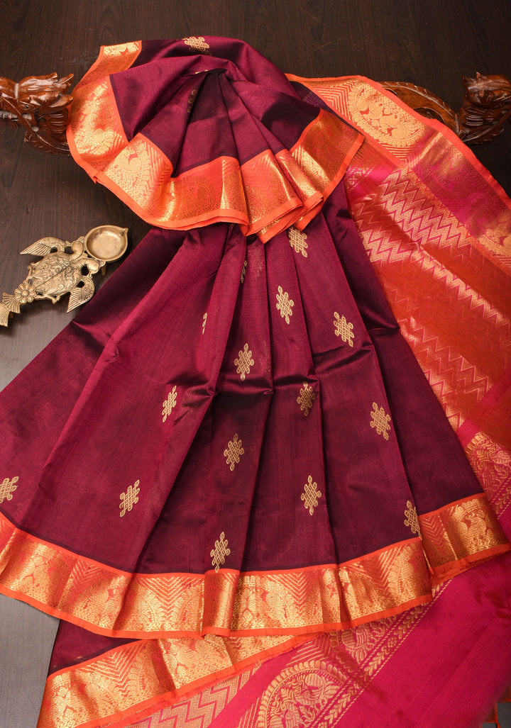 Kanchi Silk Cotton in Burgundy with Rangoli buttas and Zari border