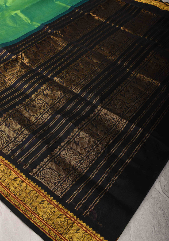 Korvai Handloom weave Green and Black Kanchi Silk Cotton Saree with Contrast Borders