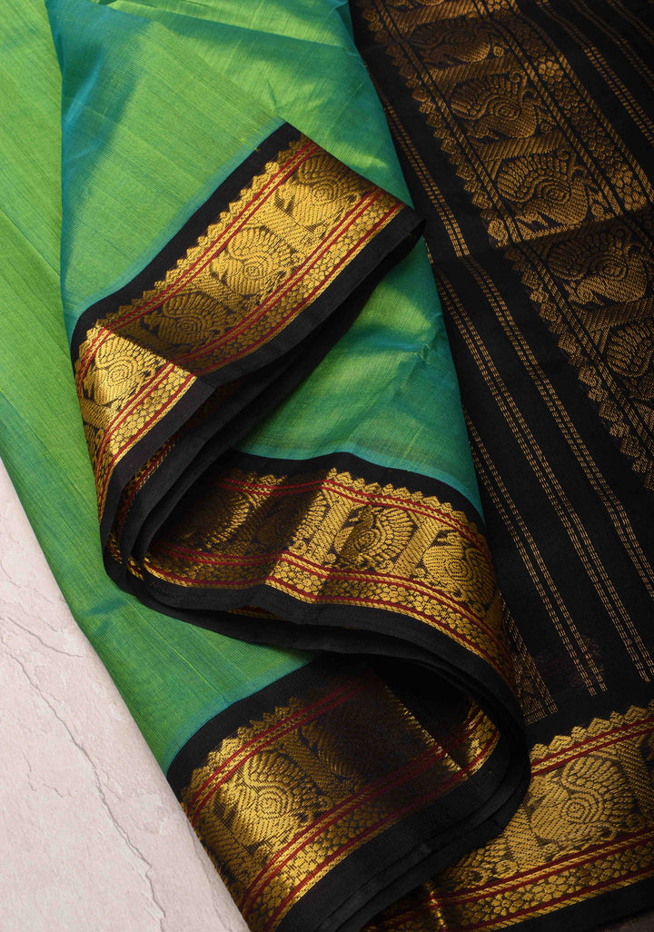 Korvai Handloom weave Green and Black Kanchi Silk Cotton Saree with Contrast Borders