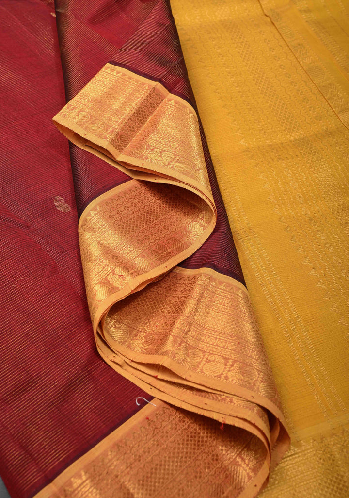 Maroon Vairaoosi Zari Stripes Kanchi Silk Cotton Korvai Handloom Saree with Zari Buttas and Contrast Zari Border