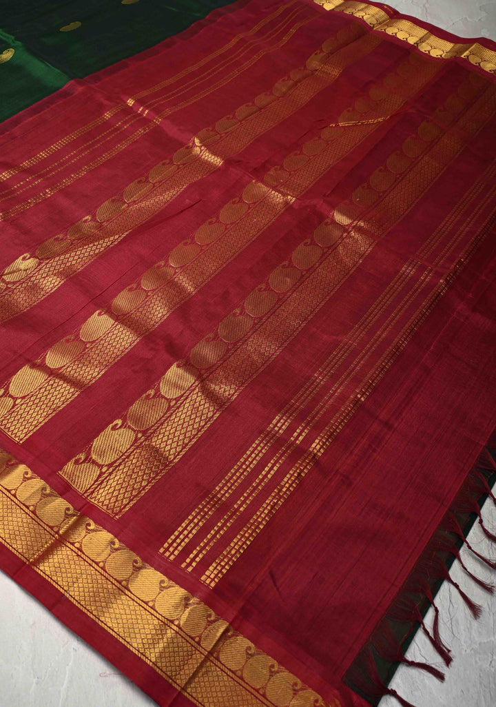 9 Yards Madisar Deep Green Kanchi Silk Cotton Handloom Saree with Paisley Buttas and Contrast Zari Border, No Blouse Piece