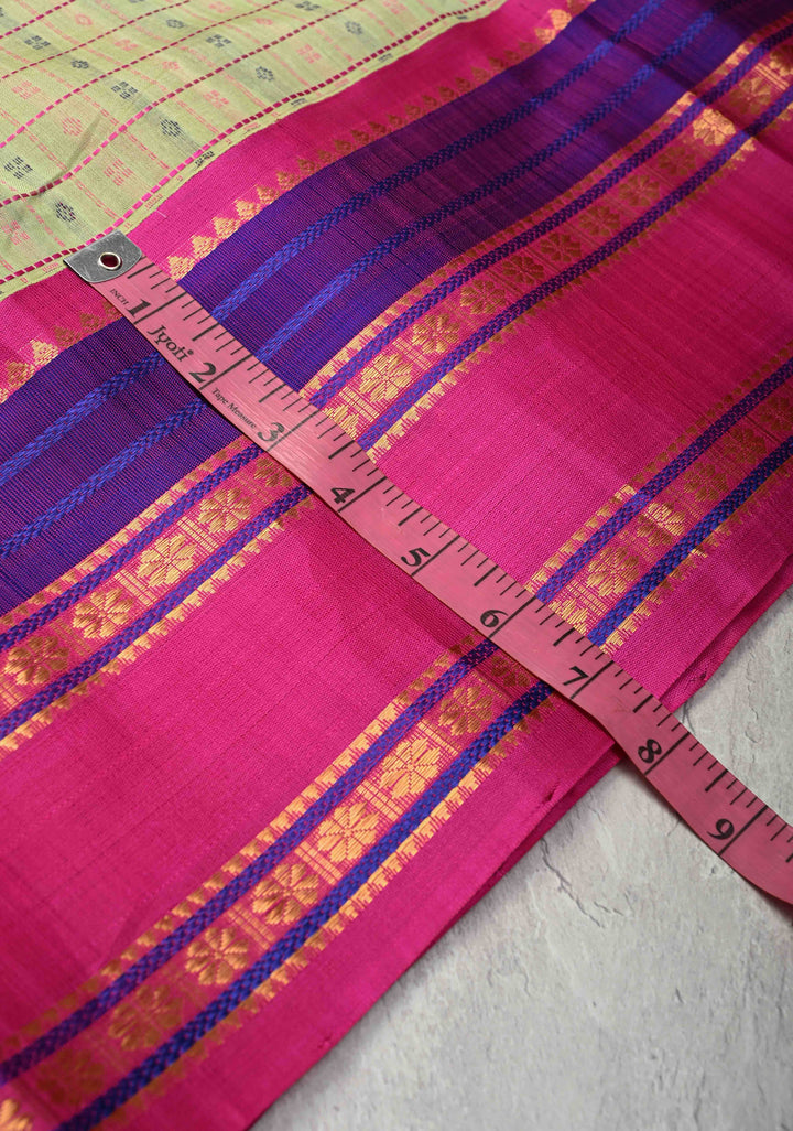 Pista Green Koravi Lakshadeepam Kanchi Silk Cotton Saree with Contrast Zari Borders