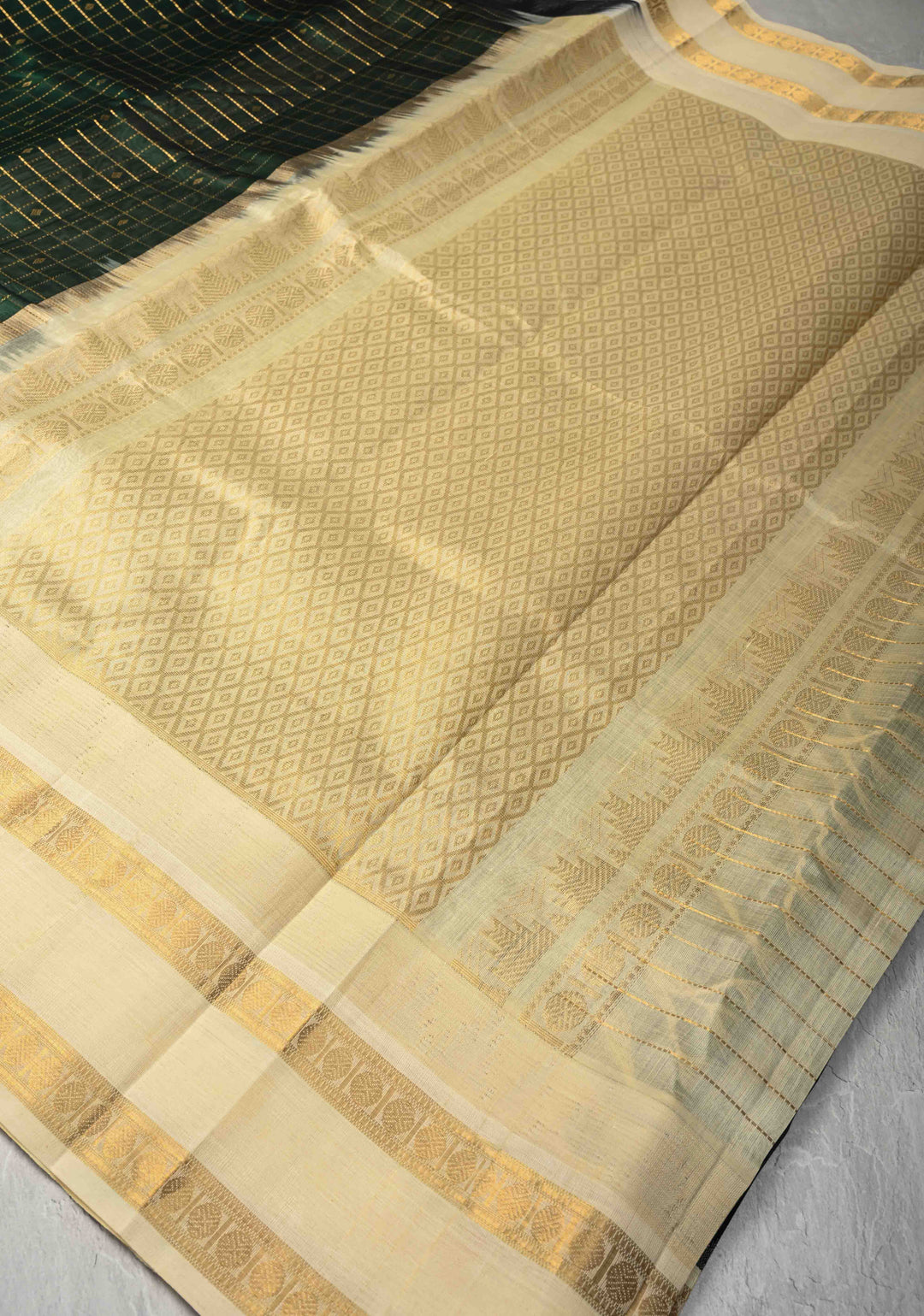 Bottle Green Zari Buttas on Kanchi Silk Cotton Saree with Zari Checks and Contrast Rettaipet Borders