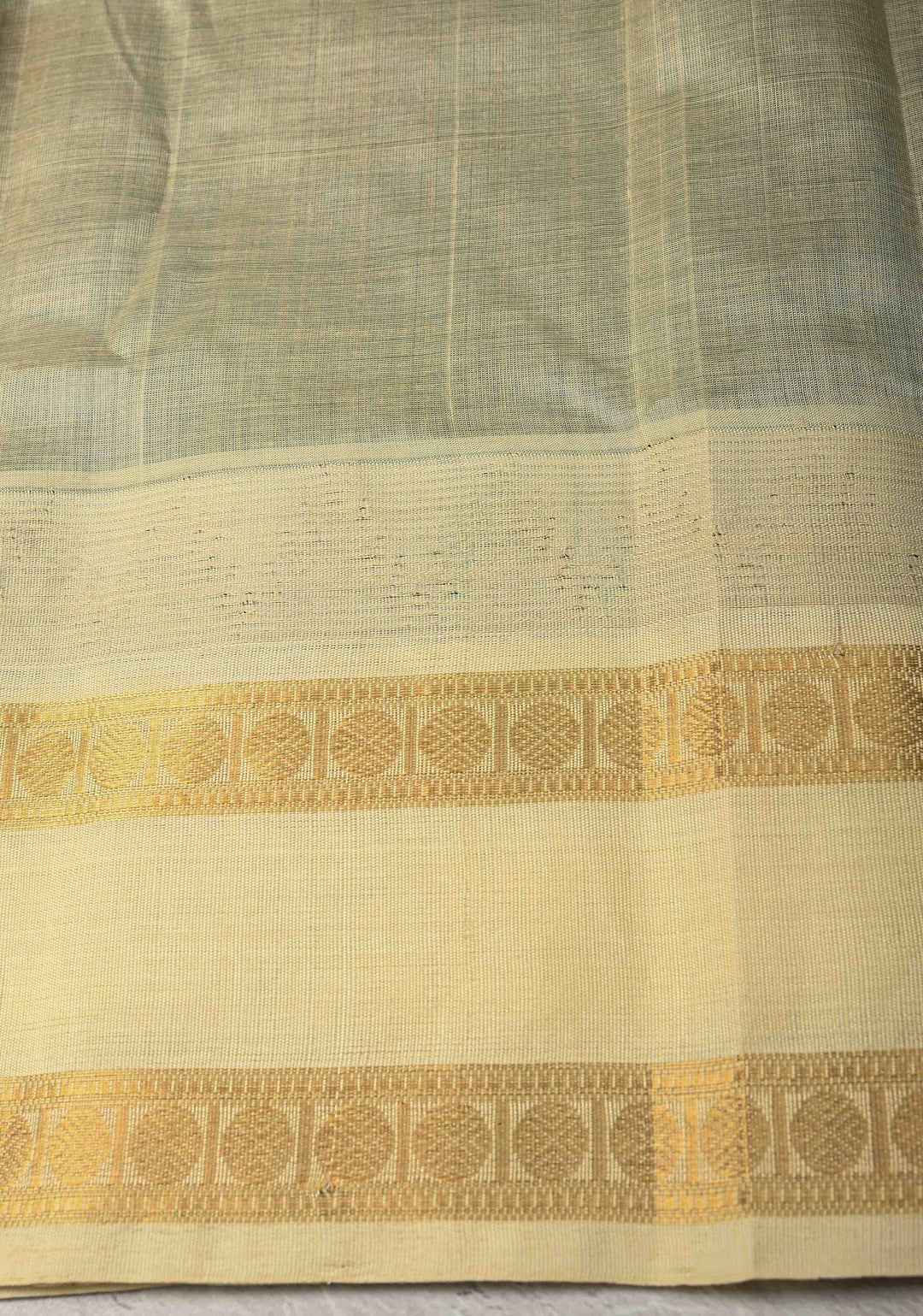Bottle Green Zari Buttas on Kanchi Silk Cotton Saree with Zari Checks and Contrast Rettaipet Borders