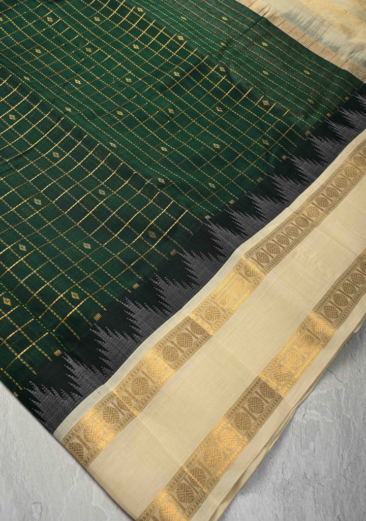 Bottle Green Zari Buttas on Kanchi Silk Cotton Saree with Zari Checks and Contrast Rettaipet Borders