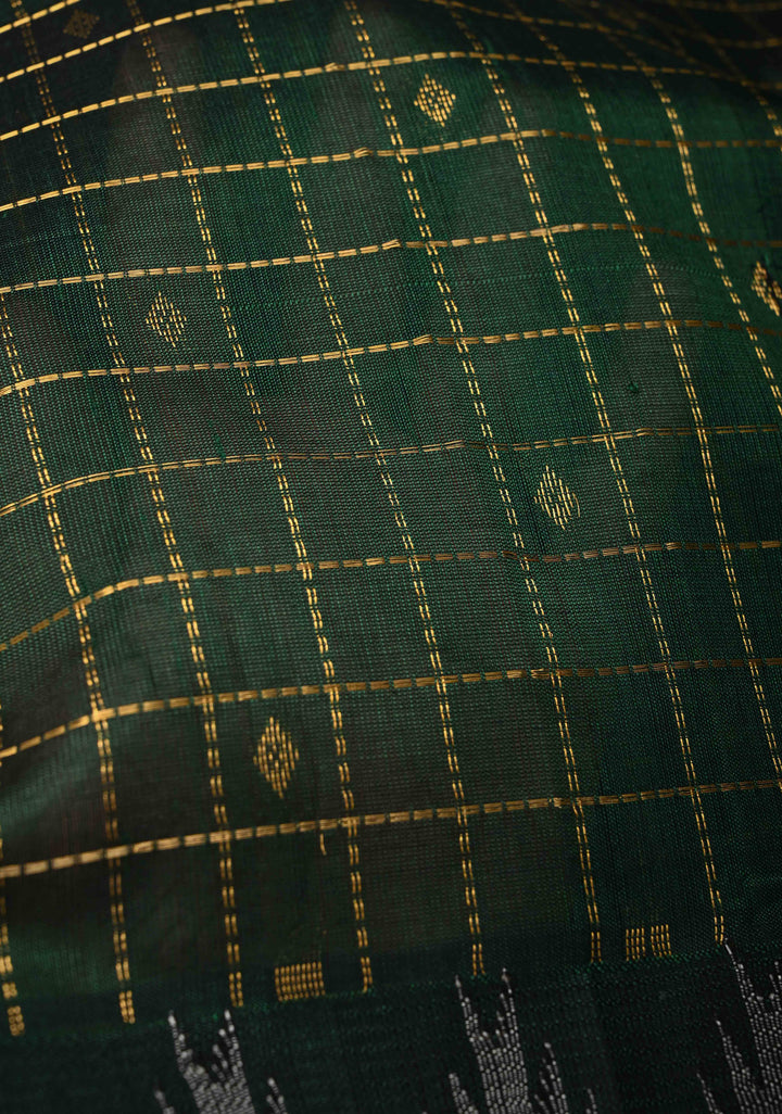 Bottle Green Zari Buttas on Kanchi Silk Cotton Saree with Zari Checks and Contrast Rettaipet Borders
