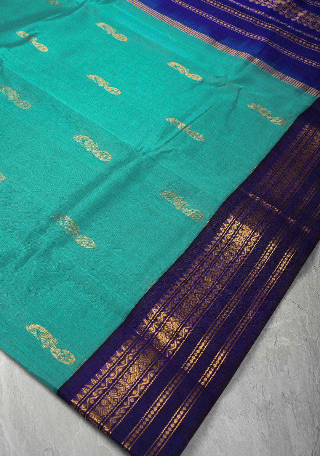 Sea Green Kanchi Silk Cotton Handloom Saree with Buttas and Koravi Contrast Zari Border
