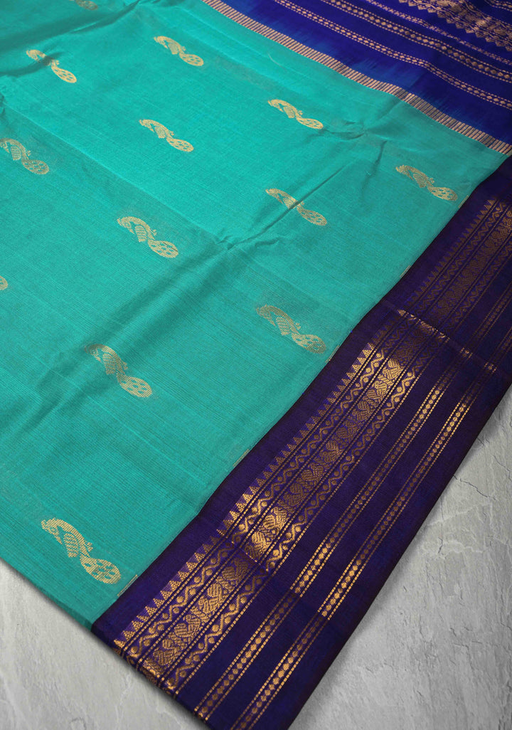 Sea Green Kanchi Silk Cotton Handloom Saree with Buttas and Koravi Contrast Zari Border