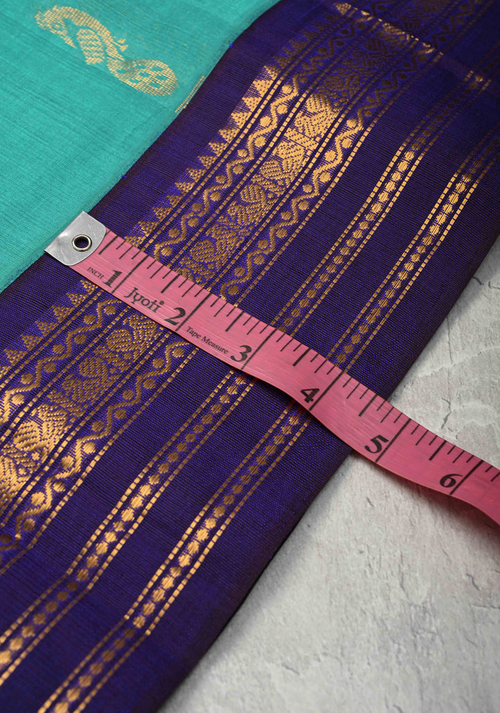 Sea Green Kanchi Silk Cotton Handloom Saree with Buttas and Koravi Contrast Zari Border