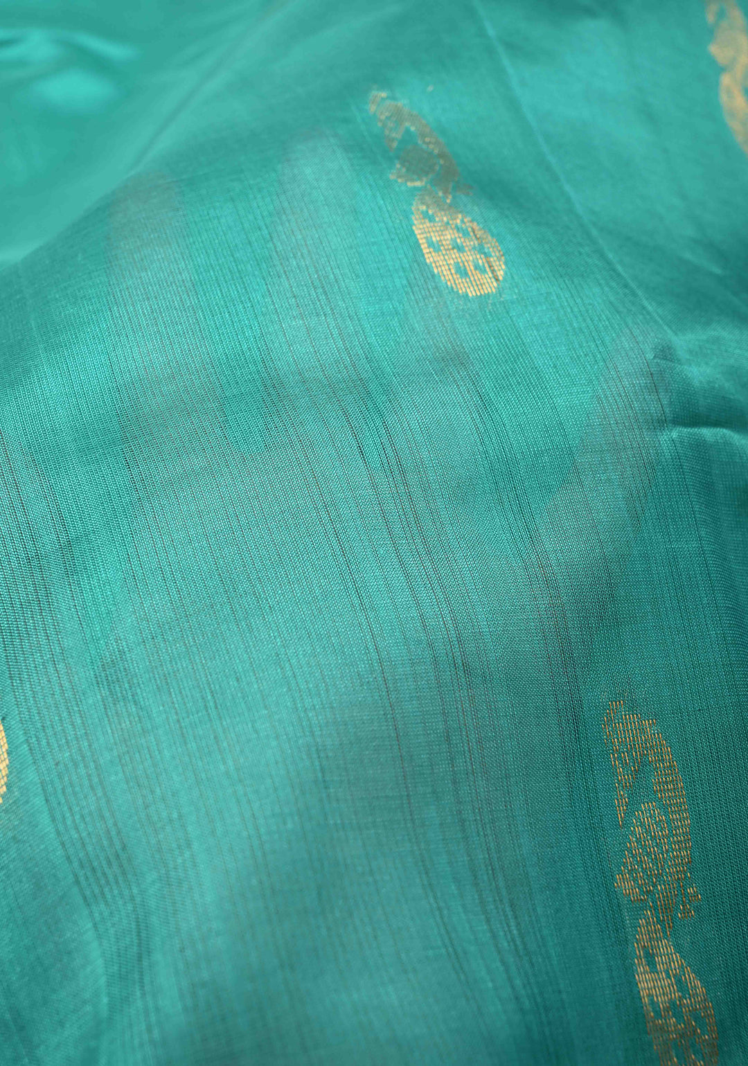 Sea Green Kanchi Silk Cotton Handloom Saree with Buttas and Koravi Contrast Zari Border