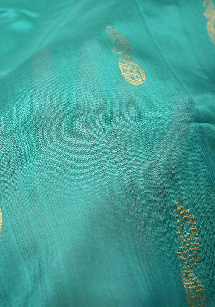 Sea Green Kanchi Silk Cotton Handloom Saree with Buttas and Koravi Contrast Zari Border