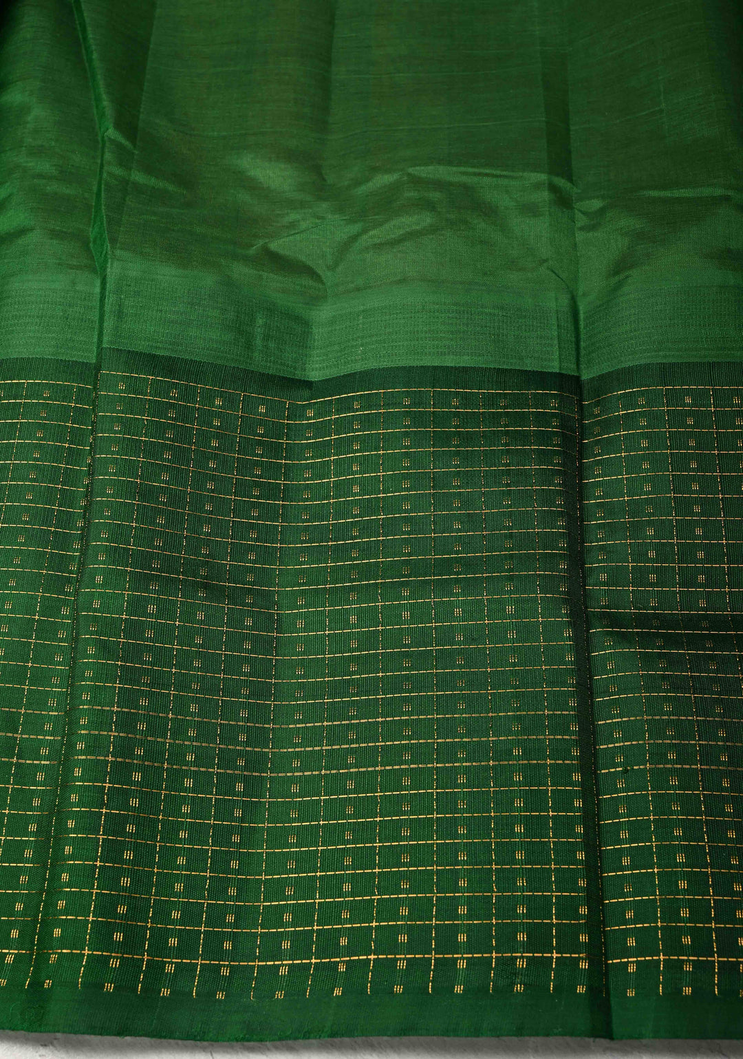 Sandstone Kanchi Silk Cotton Saree with contrast zari checks and Butta Green Border