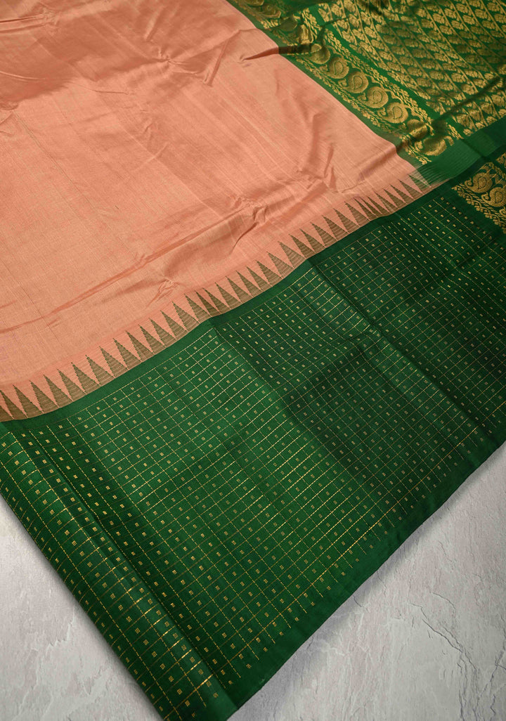 Sandstone Kanchi Silk Cotton Saree with contrast zari checks and Butta Green Border