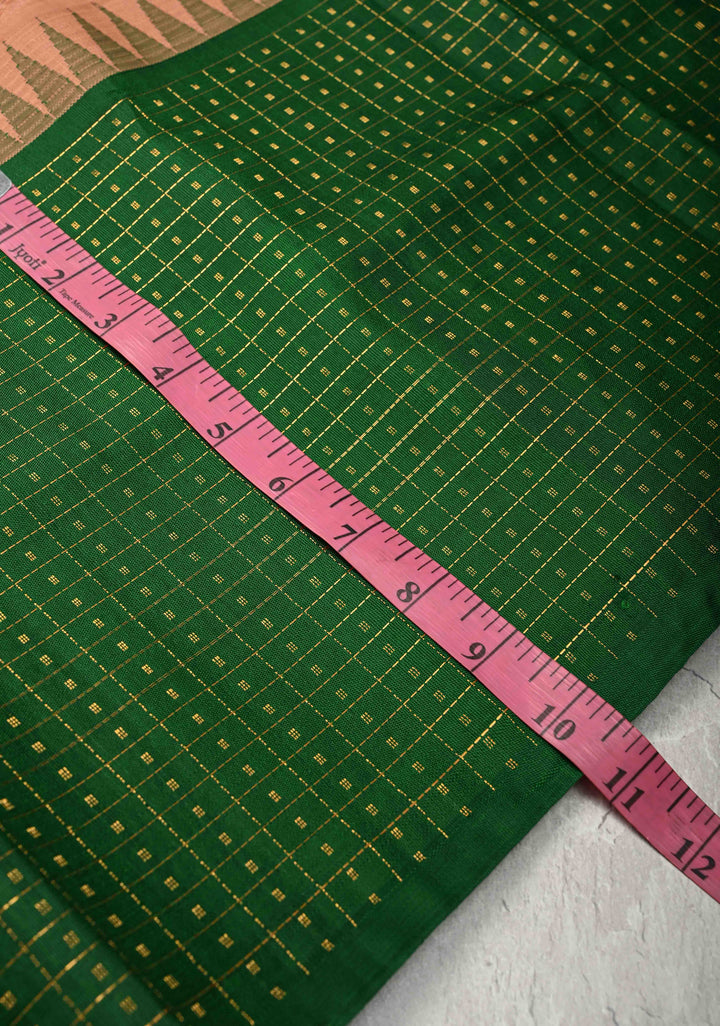Sandstone Kanchi Silk Cotton Saree with contrast zari checks and Butta Green Border