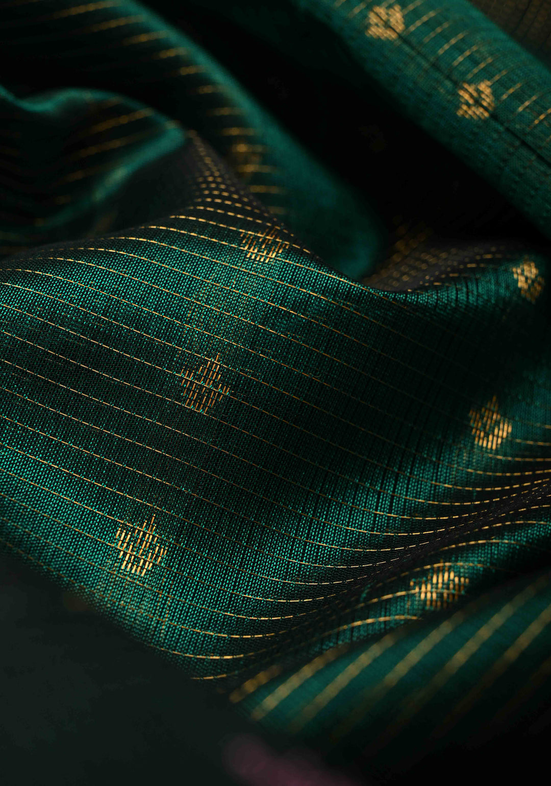 Emerald Green Vairaoosi Zari Stripes Kanchi Silk Cotton Handloom Saree with Zari Buttas and Contrast Temple Wide Zari Border