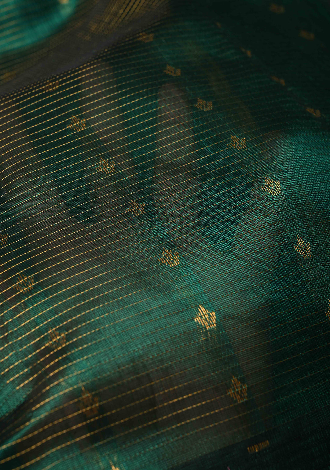 Emerald Green Vairaoosi Zari Stripes Kanchi Silk Cotton Handloom Saree with Zari Buttas and Contrast Temple Wide Zari Border
