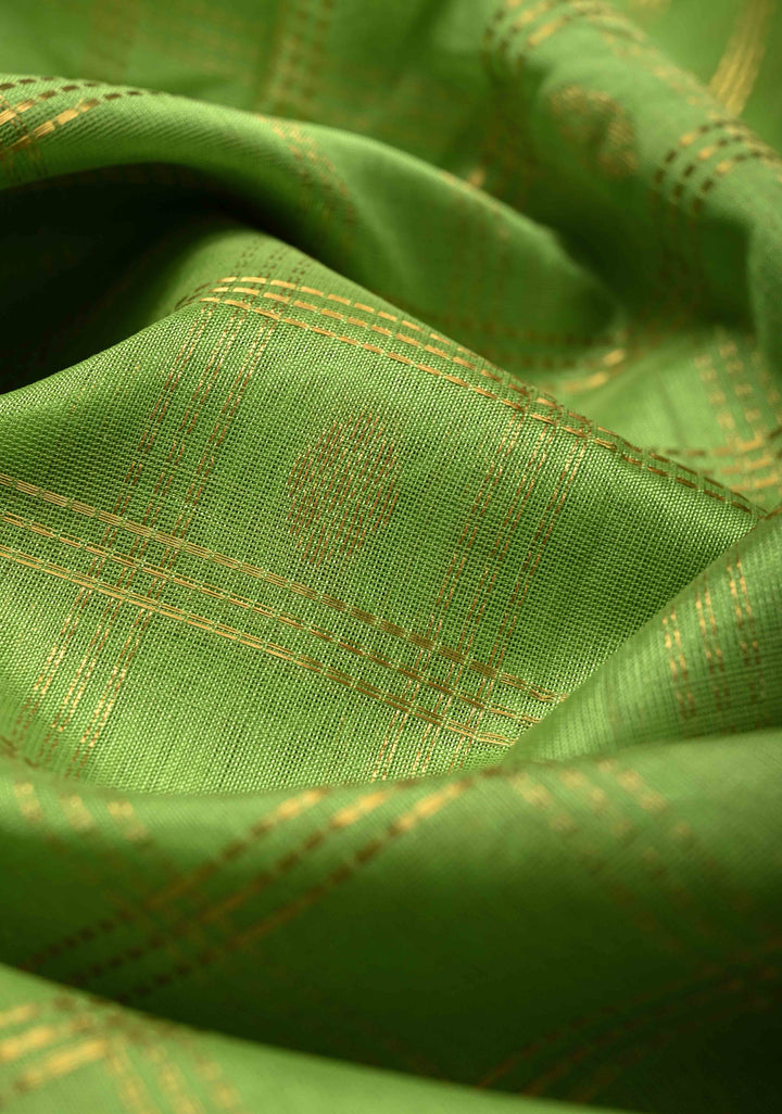 Pista Green Zari Checks on Kanchi Silk Cotton Saree with Zari Buttas and Contrast Rettaipet Border