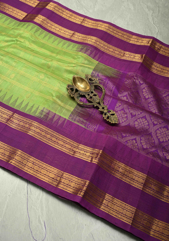 Pista Green Zari Checks on Kanchi Silk Cotton Saree with Zari Buttas and Contrast Rettaipet Border