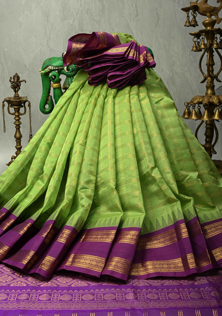 Pista Green Zari Checks on Kanchi Silk Cotton Saree with Zari Buttas and Contrast Rettaipet Border